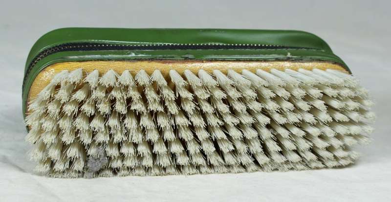 Brush with sewing kit