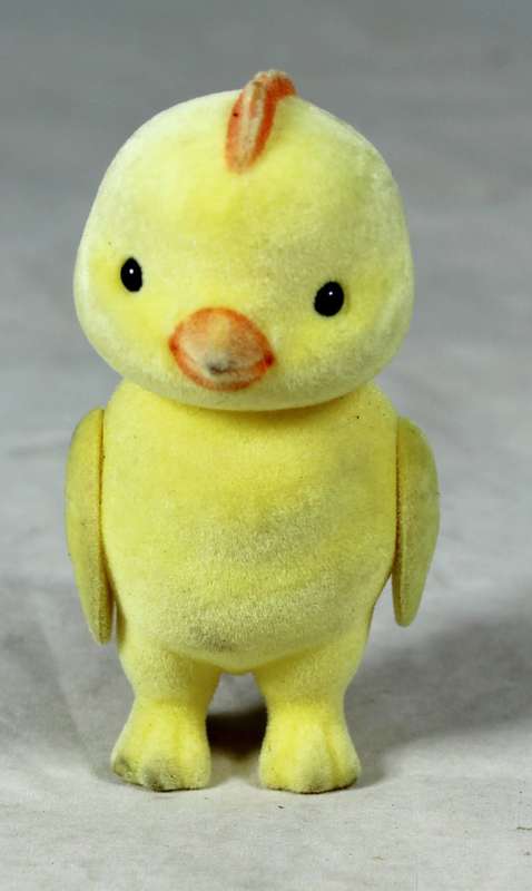 Small furry yellow chick