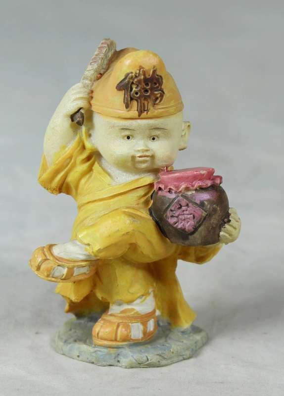 Baby Buddha - Monk Dancing with a Drum