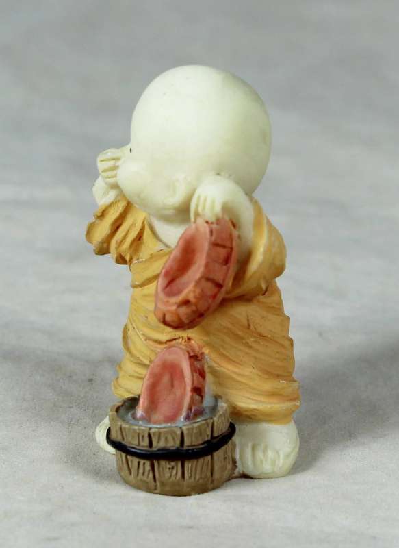 Baby Buddha - Monk Washing his Shoes
