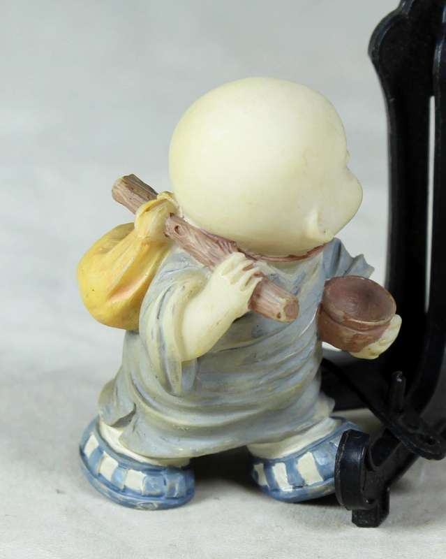 Baby Buddha - Monk Carrying his Bag and Cup