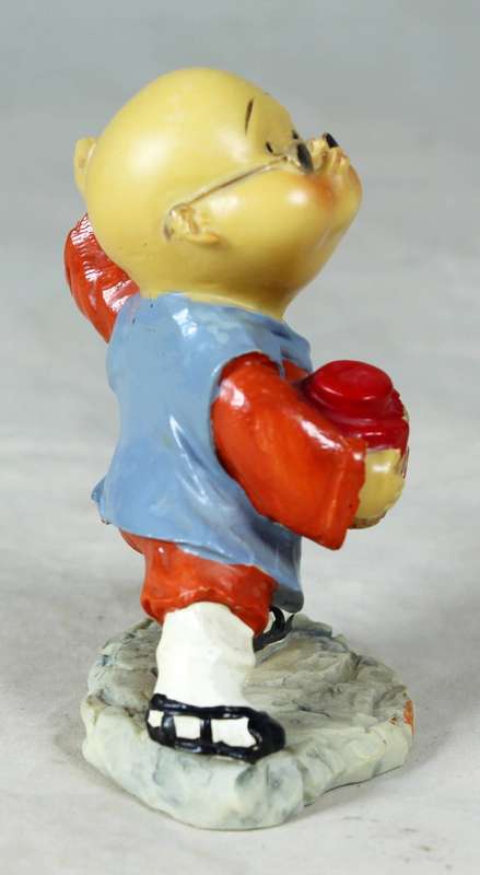 A baby Buddha - Monk striking a pose
