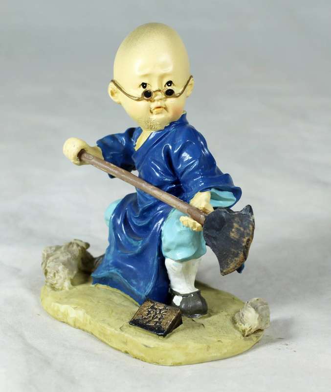 A baby Buddha - Monk fighting practice