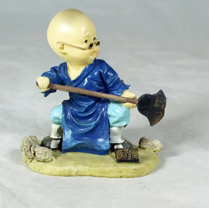 A baby Buddha - Monk fighting practice
