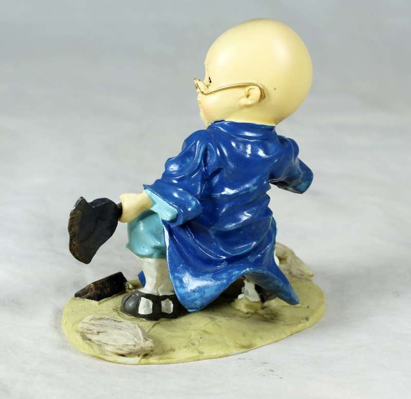 A baby Buddha - Monk fighting practice
