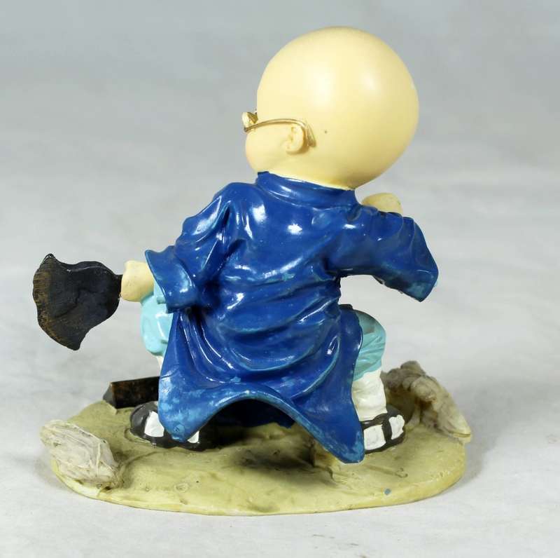 A baby Buddha - Monk fighting practice