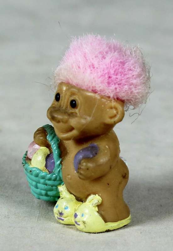 A  MINIATURE TROLL DOLL WITH A PUNK HAIR CUT - BID NOW!!!!
