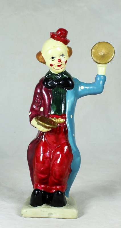 Clown figurine playing symbols