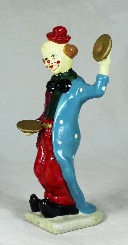 Clown figurine playing symbols