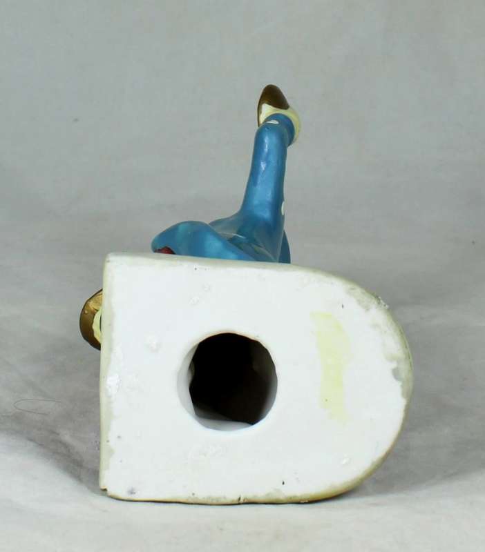 Clown figurine playing symbols