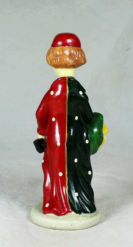 Clown holding a book with his foot