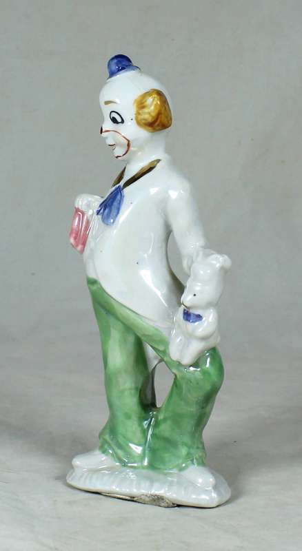 Clown holding a rabbit