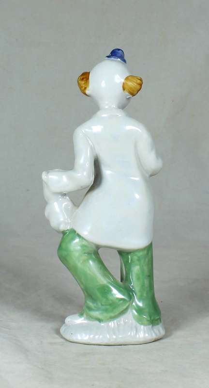 Clown holding a rabbit