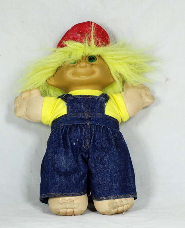 Large troll doll with denim dungarees