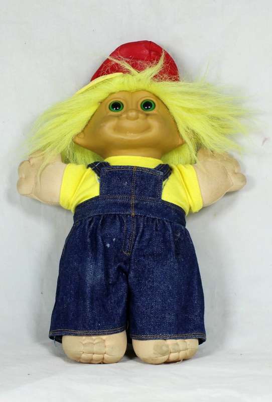 Large troll doll with denim dungarees