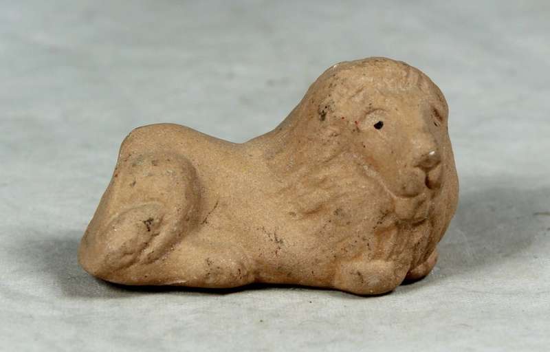 Miniature unglazed lion