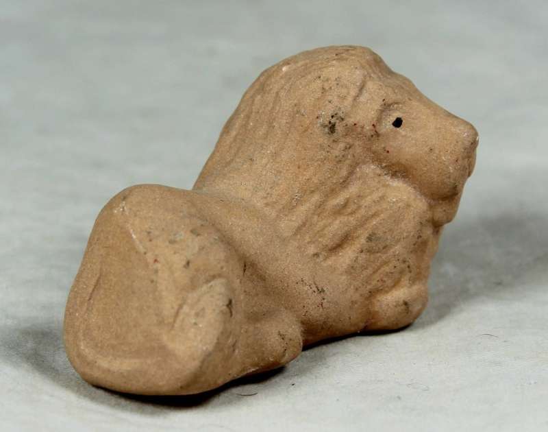 Miniature unglazed lion