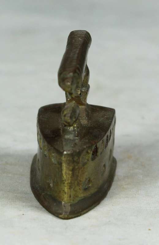 Miniature brass coal iron