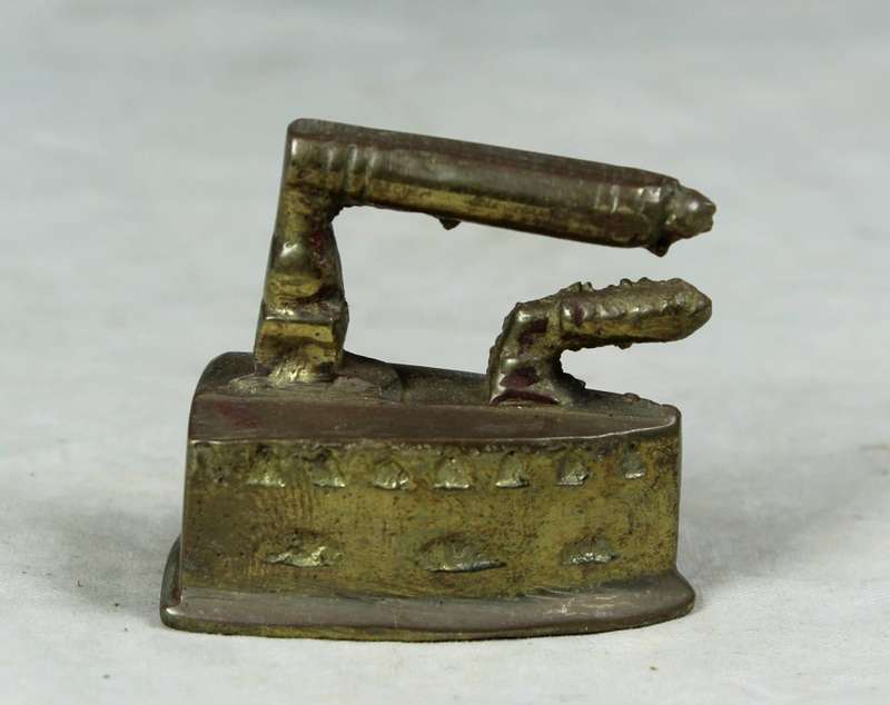 Miniature brass coal iron