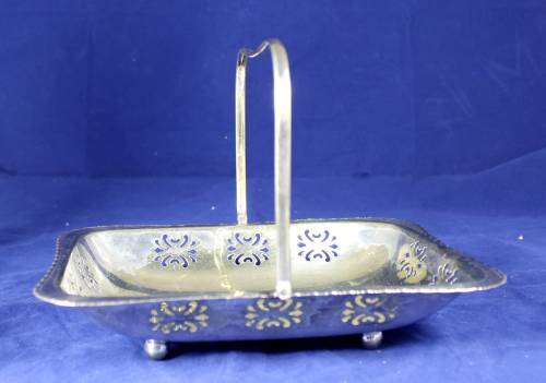 Perforated silver plated swing handle tray