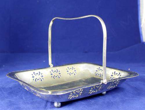 Perforated silver plated swing handle tray