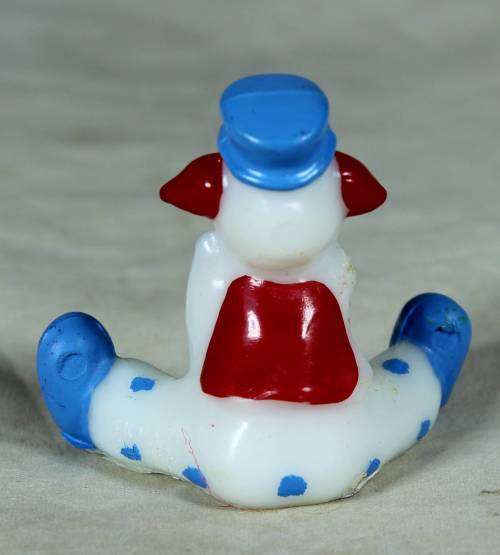 Miniature blue and white clown with red ears