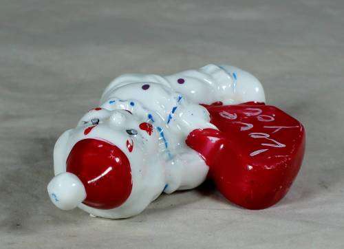 PORCELAIN CLOWN HOLDING AN `I LOVE YOU HEART