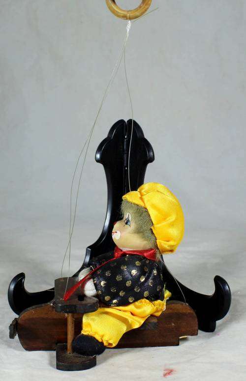 CLOWN SITTING IN A PLANE HANGING FROM A ROPE  - BID NOW!!
