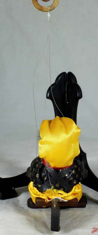 CLOWN SITTING IN A PLANE HANGING FROM A ROPE  - BID NOW!!