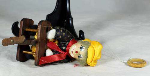CLOWN SITTING IN A PLANE HANGING FROM A ROPE  - BID NOW!!