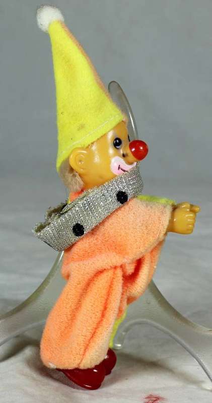 A PLASTIC CLOWN WITH RED SHOES - BID NOW!!