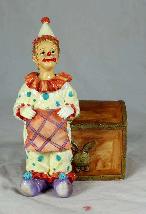 Clown with a brown treasure chest money box