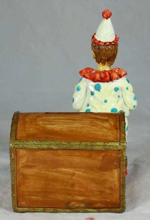 Clown with a brown treasure chest money box