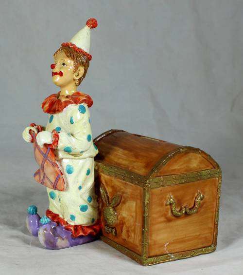 Clown with a brown treasure chest money box