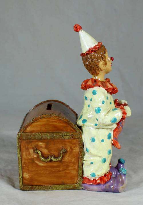 Clown with a brown treasure chest money box