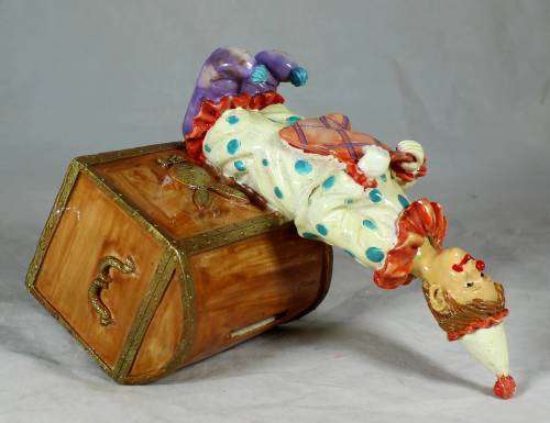 Clown with a brown treasure chest money box