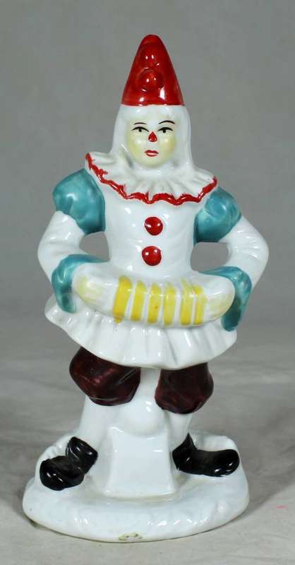 PORCELAIN CLOWN PLAYING THE CONCERTINA ON A STAND - BID NOW!!
