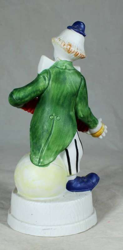 CLOWN ON A STAND PLAYING A CONCERTINA - BID NOW!!