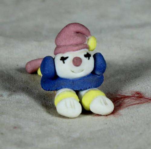 MINIATURE CLOWN LAYING DOWN - BID NOW!!