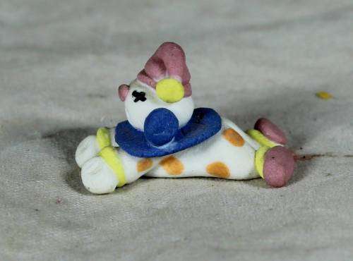 MINIATURE CLOWN LAYING DOWN - BID NOW!!