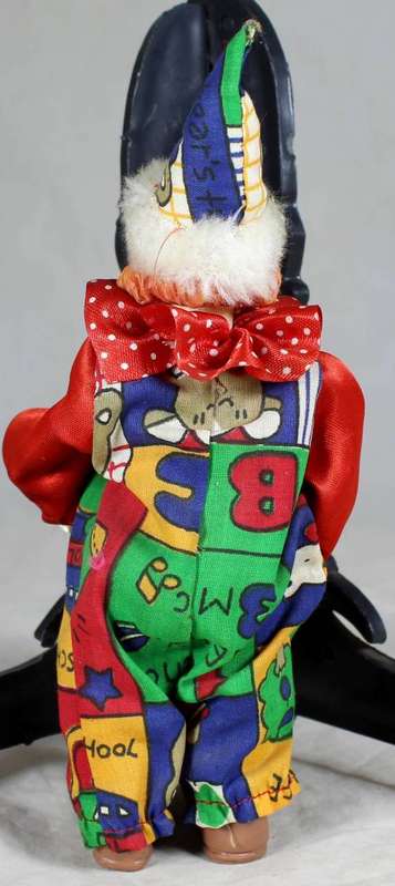 CLOWN IN A RED SUIT PLAYING - BID NOW!!