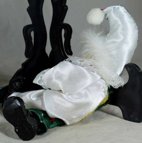 CLOWN LYING DOWN WITH AN UMBRELLA - BID NOW!!