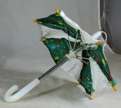 CLOWN LYING DOWN WITH AN UMBRELLA - BID NOW!!