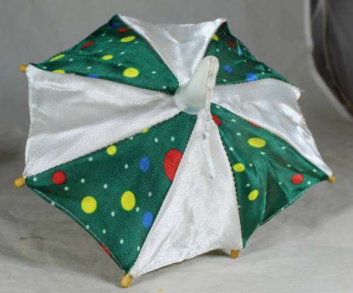 CLOWN LYING DOWN WITH AN UMBRELLA - BID NOW!!
