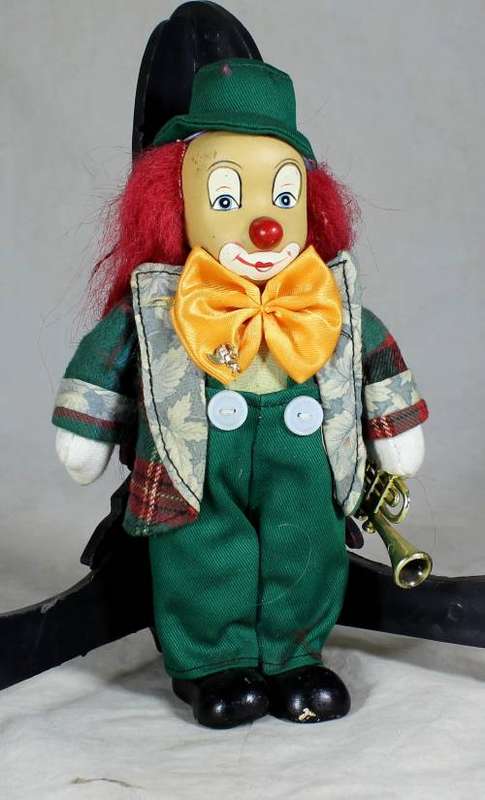 CLOWN PLAYING THE SAXOPHONE- BID NOW!!
