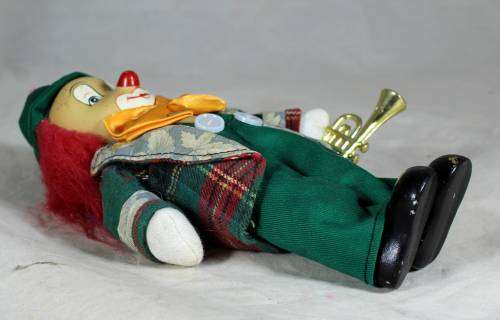 CLOWN PLAYING THE SAXOPHONE- BID NOW!!