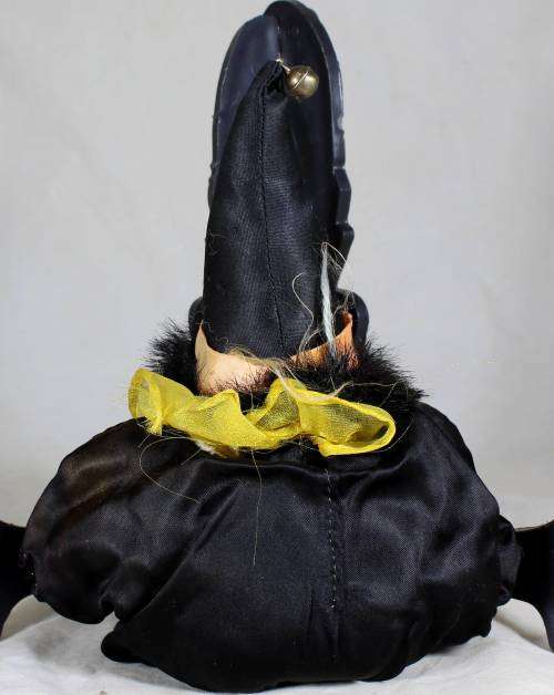 Pierrot clown in a black suit
