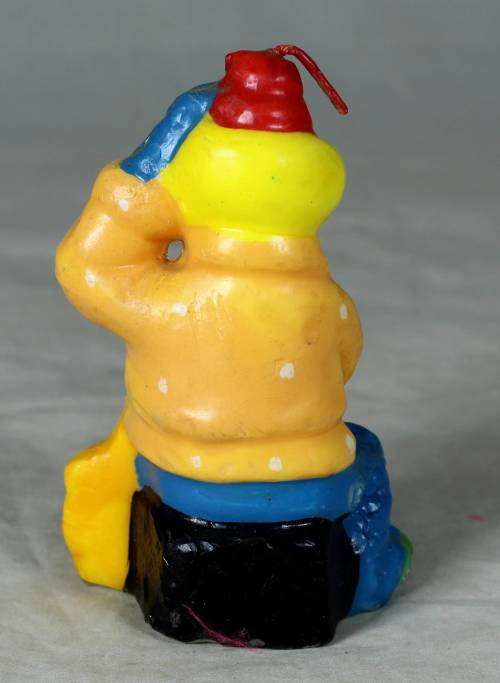 Orange and blue clown candle