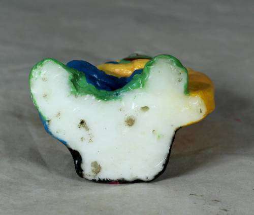 Orange and blue clown candle
