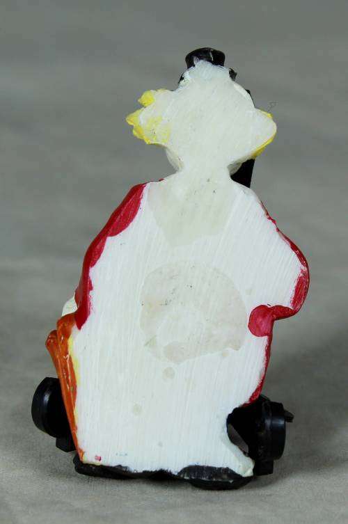 MOLDED CLOWN HOLDING AN UMBRELLA - BID NOW!!